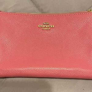 Coach small bag Coral color, only used once did not match my bigger bag.